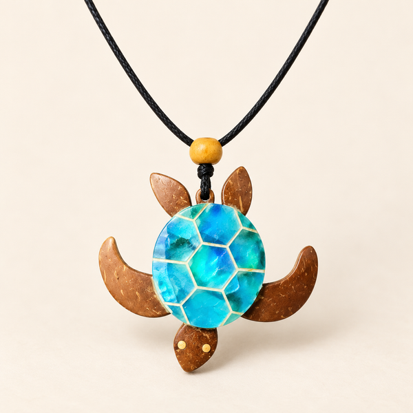 Blue Sea Turtle Coconut Shell Pendant Necklace, studio view showing pendant, bead and black cord on ivory background