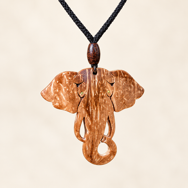 Elephant head coconut shell pendant necklace, front view on an ivory background