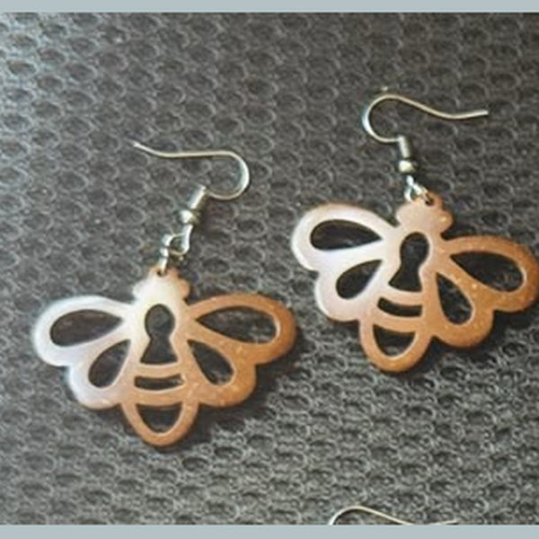 Pair of openwork honey bee dangling earrings, real product view