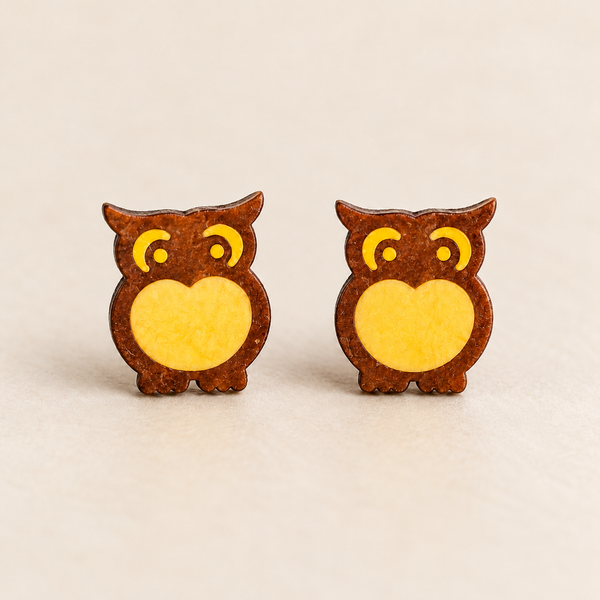 Midnight owl stud earrings with a flat face, studio pair