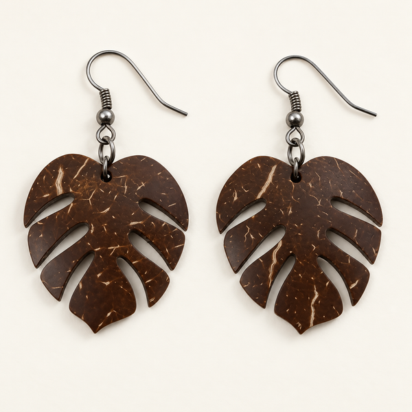 Monstera Leaf Coconut Shell Dangle Earrings, studio pair with hook fittings on ivory background
