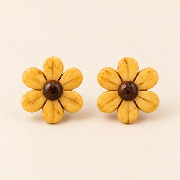 Yellow Daisy Flower Stud Earrings, matching studio pair on an ivory background